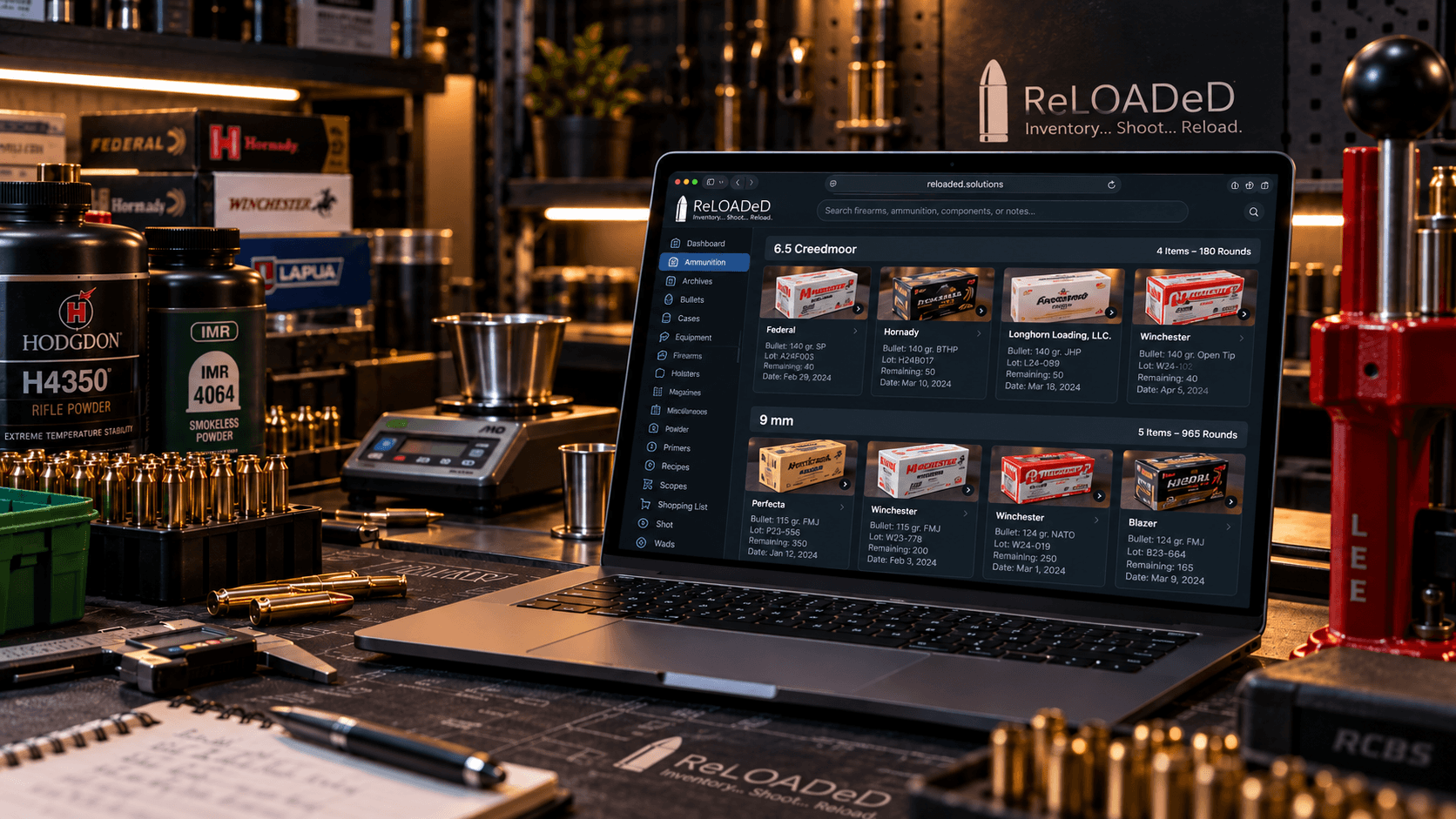 Organized reloading bench with components, scale, and ReLOADeD inventory open on a laptop